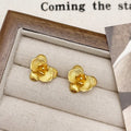 Women's retro floral copper earrings with electroplated gold or silver finish showing petal flower design