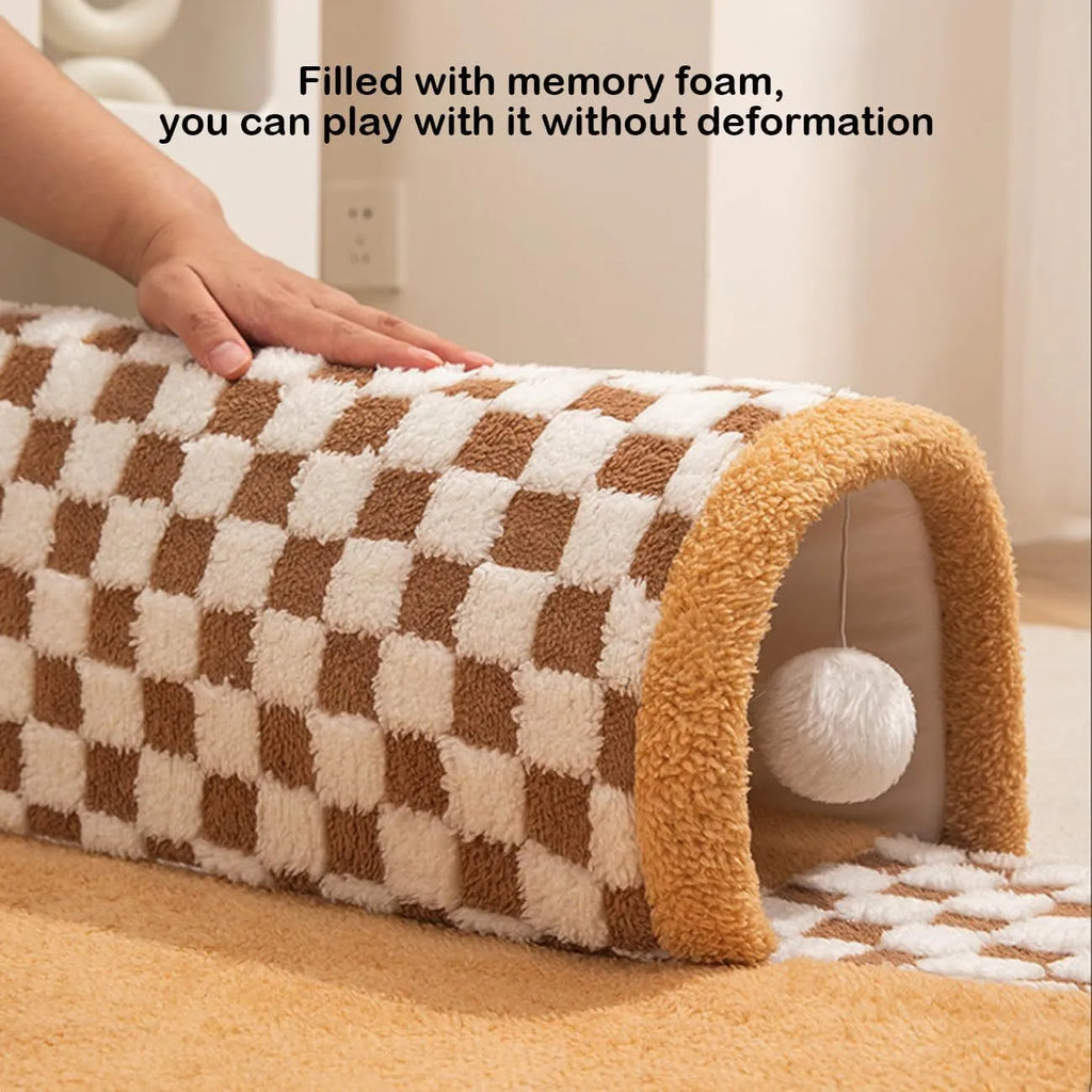 Fan-shaped plush pet bed with integrated tunnel in yellow, showing soft fabric and anti-slip base.