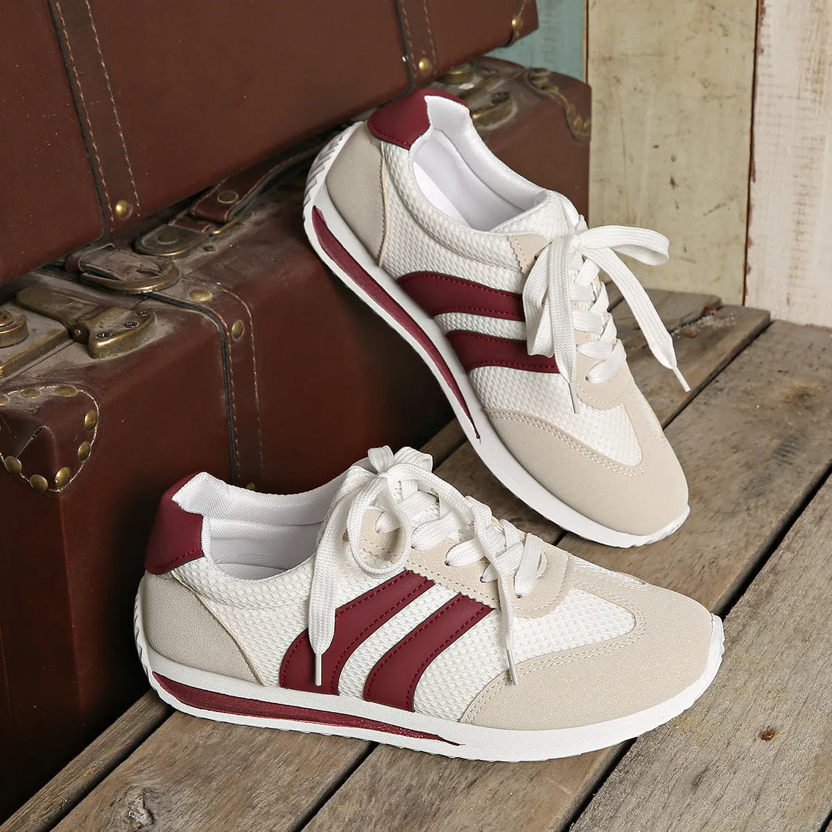 Wine red Cortez retro sneaker with breathable mesh surface and cross straps, low top flat heel, sizes 36-43