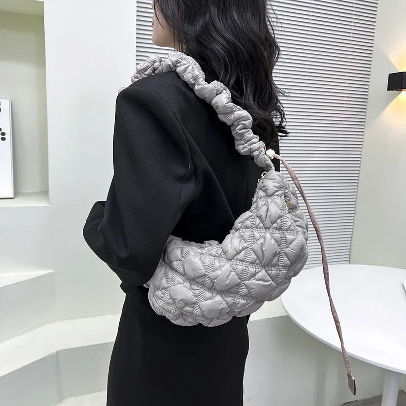 Women's nylon shoulder messenger bag in solid colour with adjustable strap showing dimensions 35cm wide by 20cm high