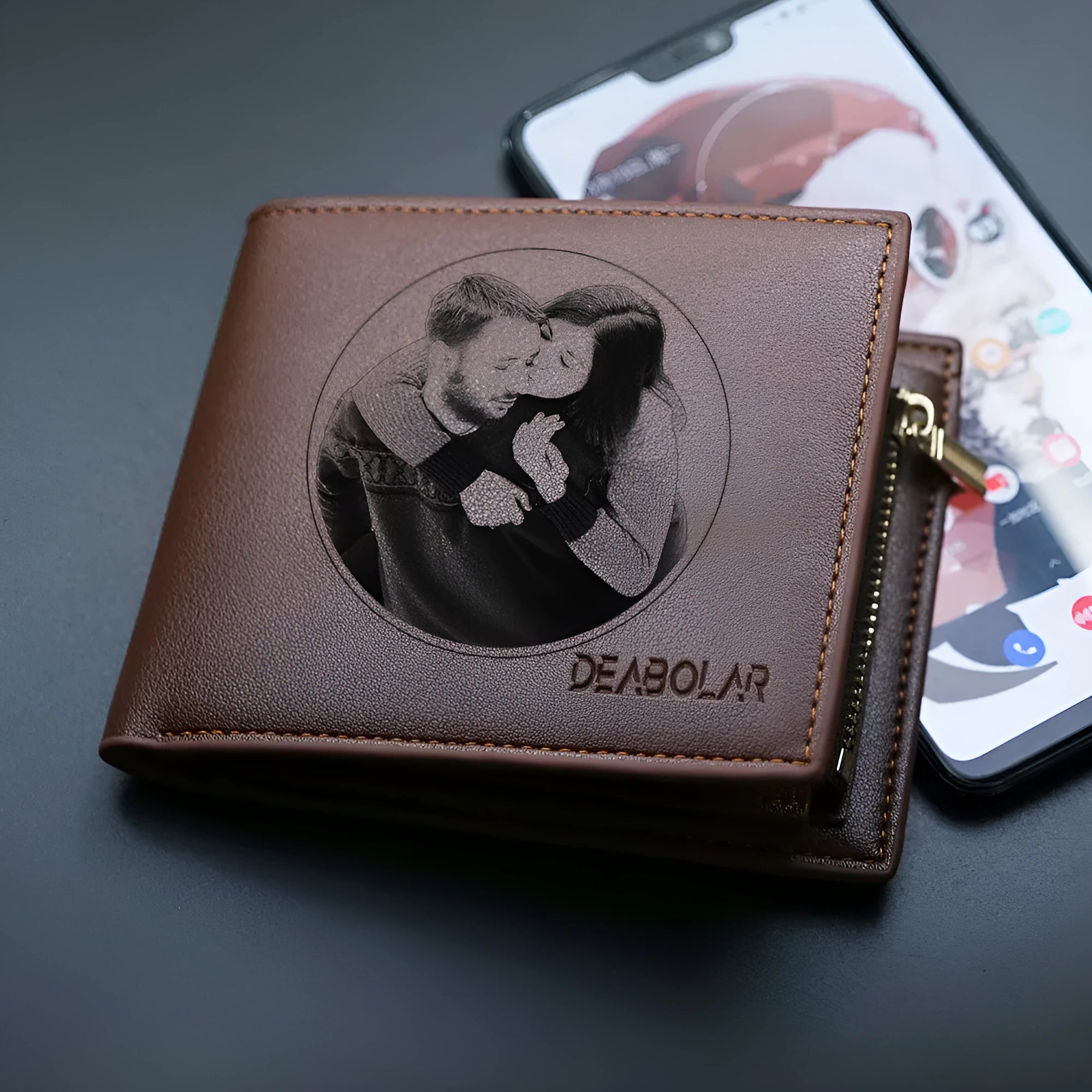 Men's brown leather wallet with a silver zipper closure, shown with individual packaging.