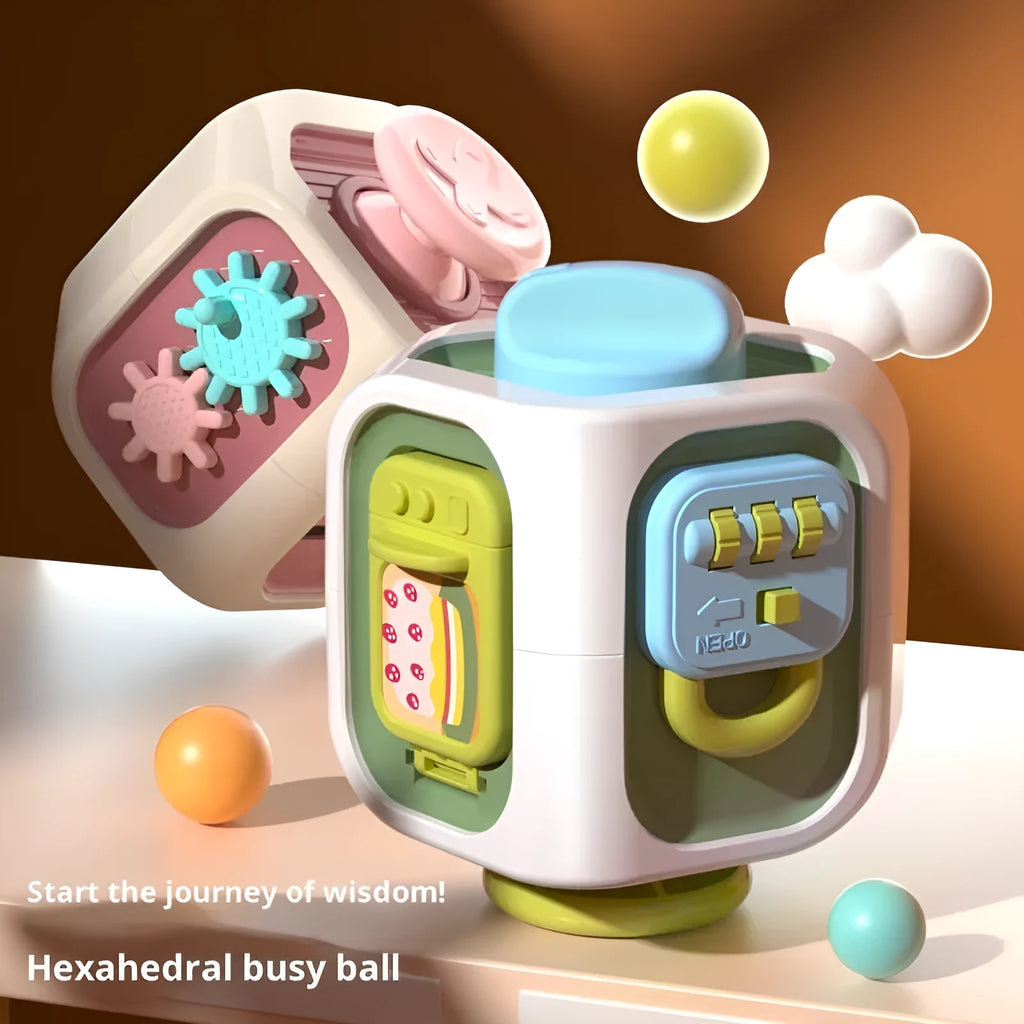 Hexahedral busy ball cube educational toy in green or pink with colour box packaging