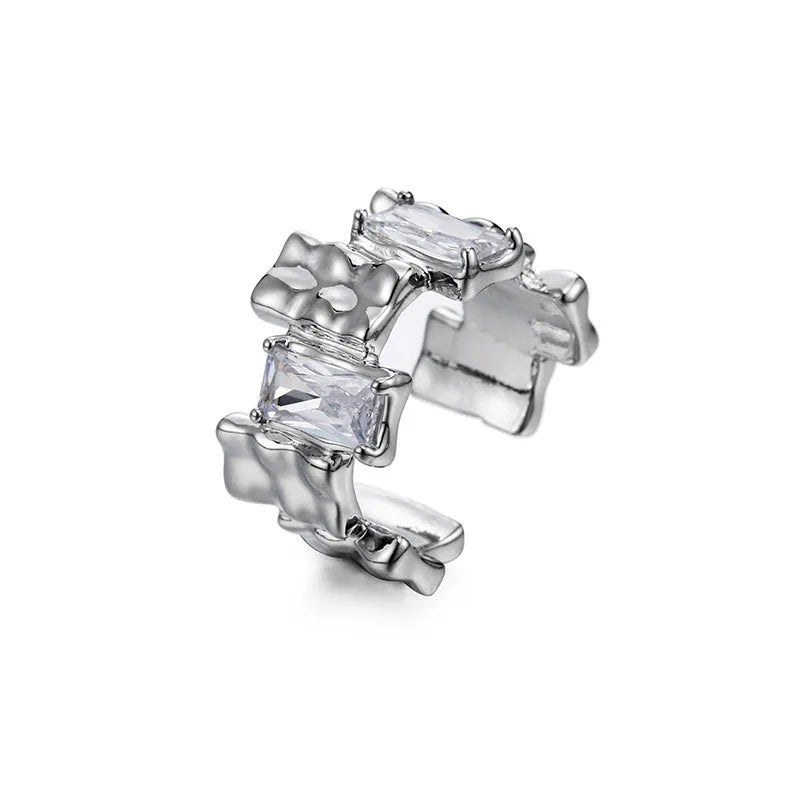 Silver plated open ring with geometric cross zircon and retro design.