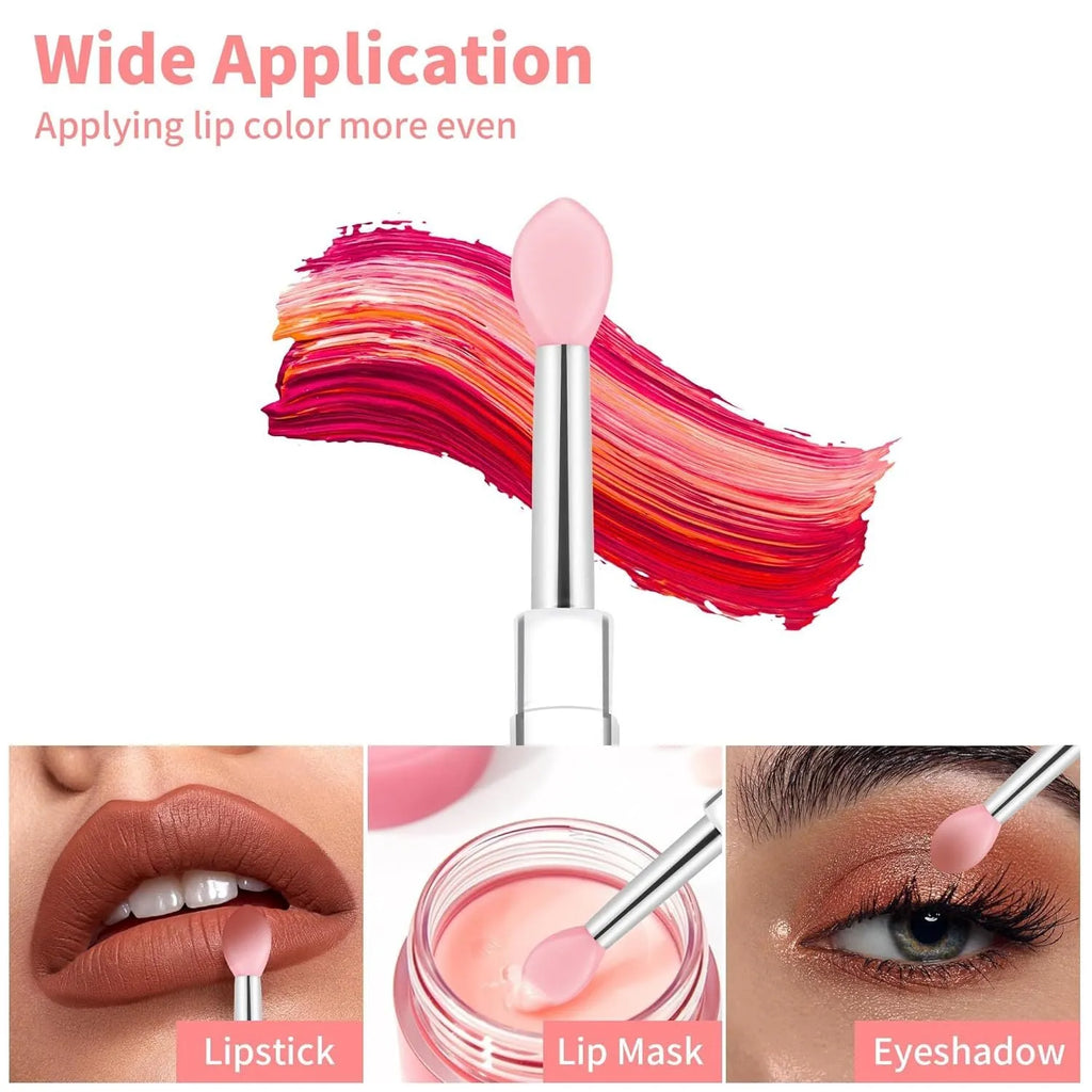 Set of reusable silicone lip brushes with protective caps in various colours on a pink background.