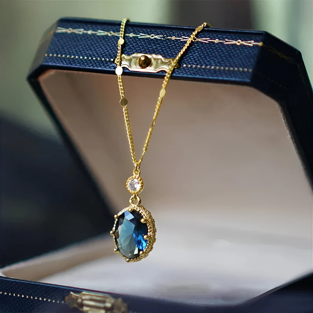 Gold geometric pendant necklace on chain with French retro design