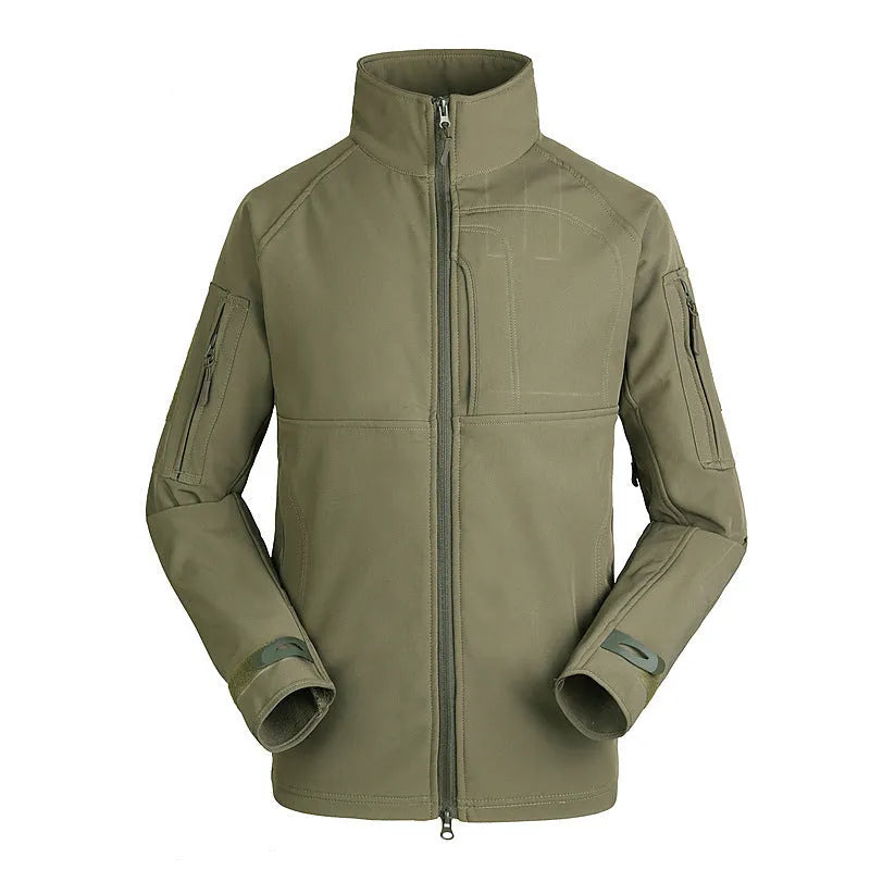 Man wearing a thin green commander stand collar outdoor jacket with a loose fit.