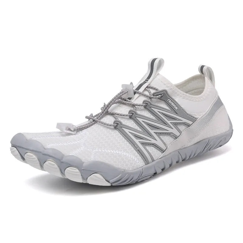 Lightweight indoor fitness training shoes with striped mesh upper and rubber sole in multiple colours.