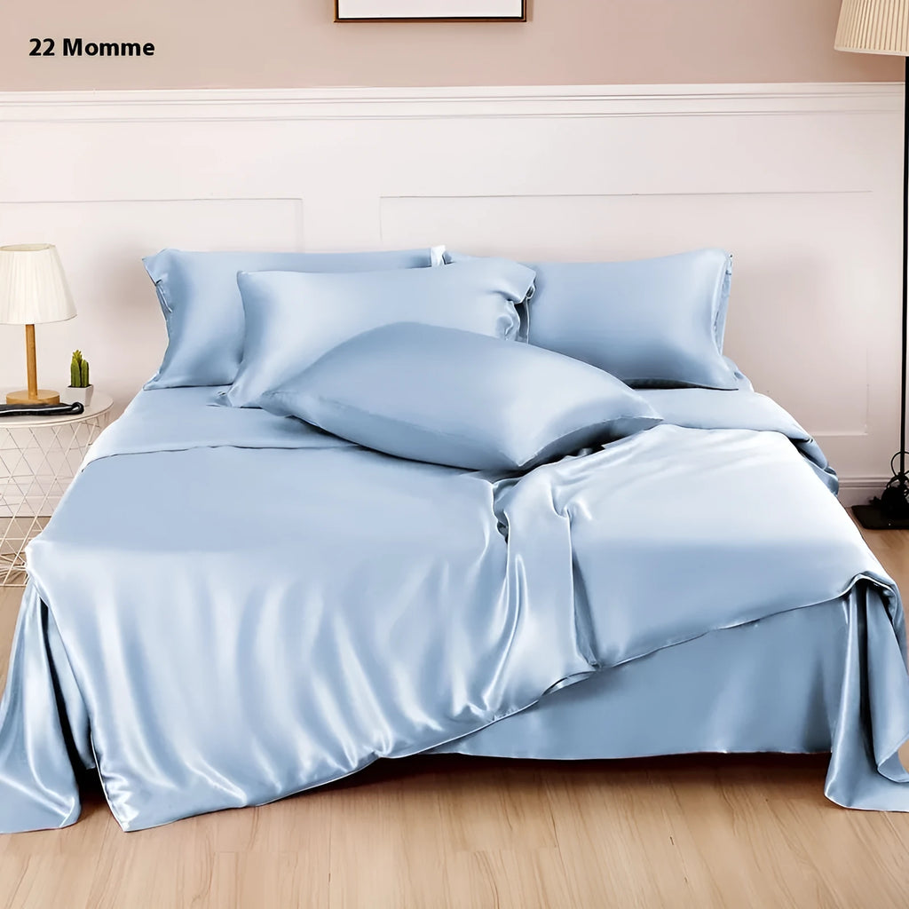 Double-sided silk duvet cover showing reversible solid colours in lotus pink and pea green options