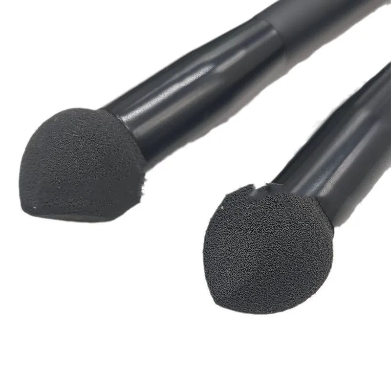 Black sponge concealer brush with wooden handle for dark circle coverage