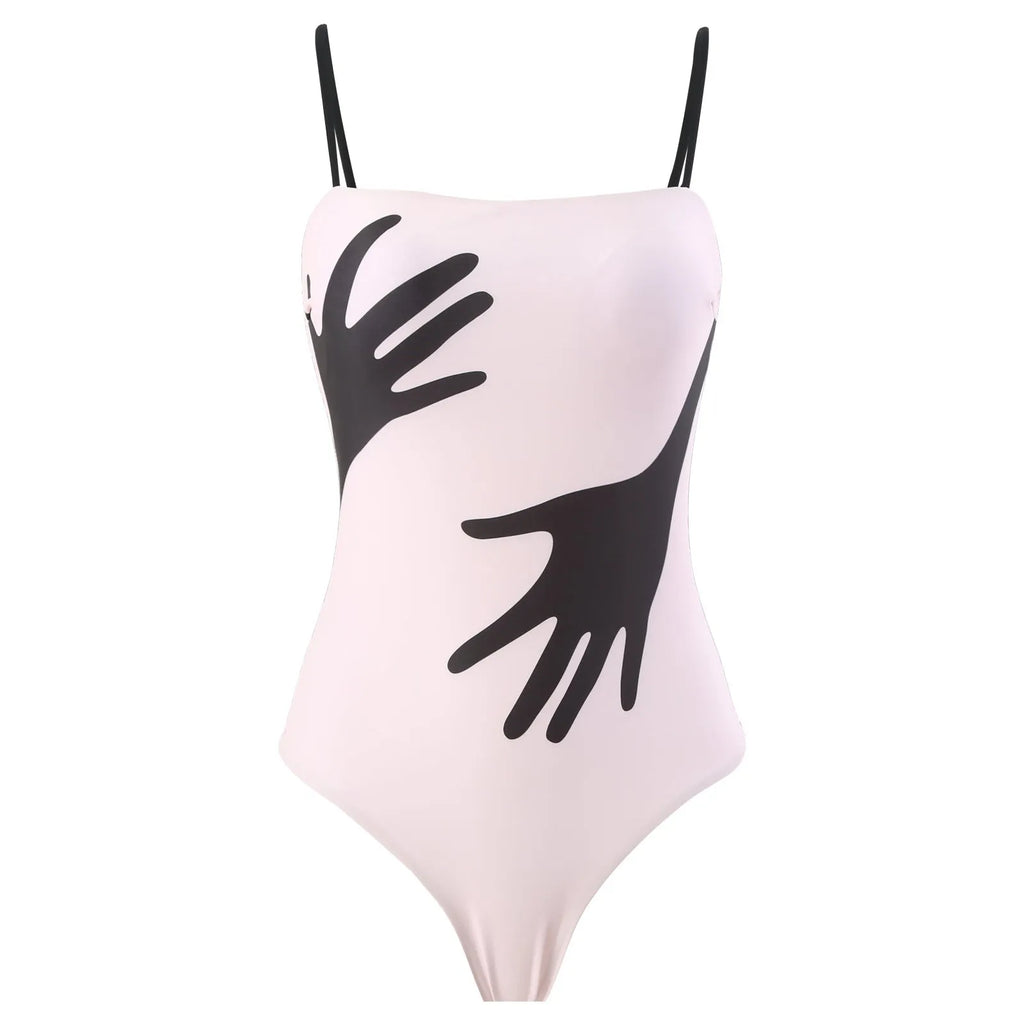 Women's one-piece bikini swimsuit with an attached white tulle skirt, shown on a mannequin.