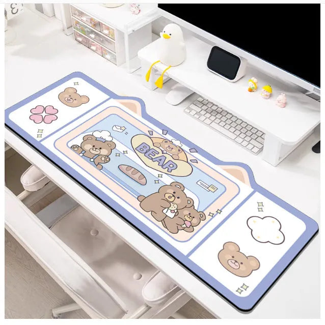 Oversized natural rubber desk pad mouse mat in Pink Bunny design showing 50x100cm size on office desk