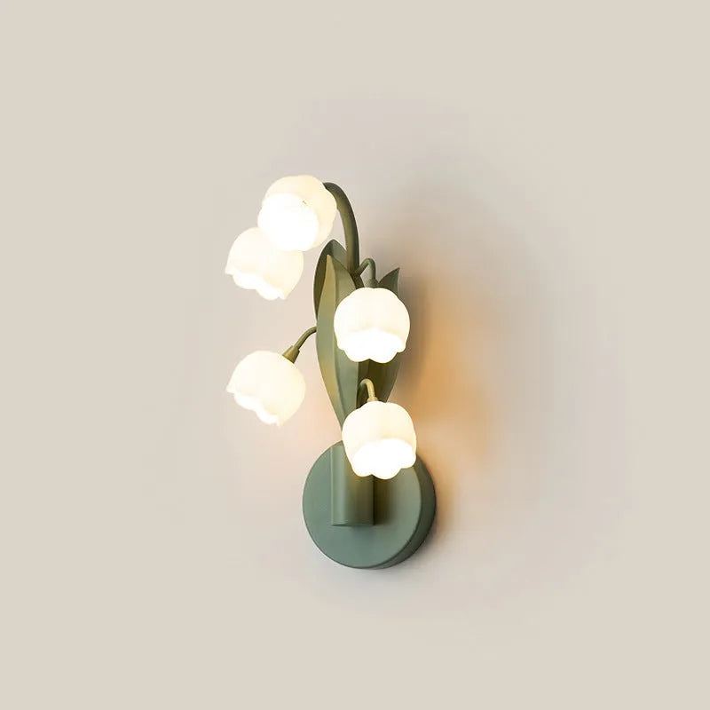 Green-tricolour French pastoral style wall lamp with a white minimalist PC shade mounted on a bedroom wall.