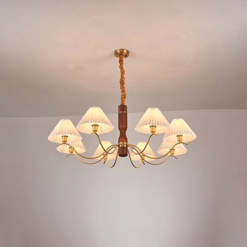 American retro-style wooden wall lamp with a fabric shade in a walnut finish on a bedroom wall.