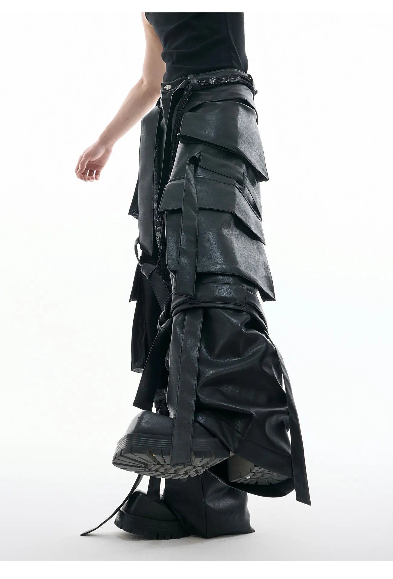 Men's black loose fit leather trousers with quilted detailing and multiple pockets