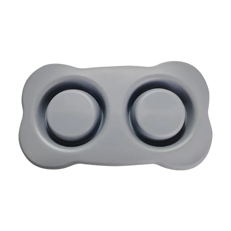 Large silicone dog bowl with stainless steel insert in blue, showing double-bowl design.