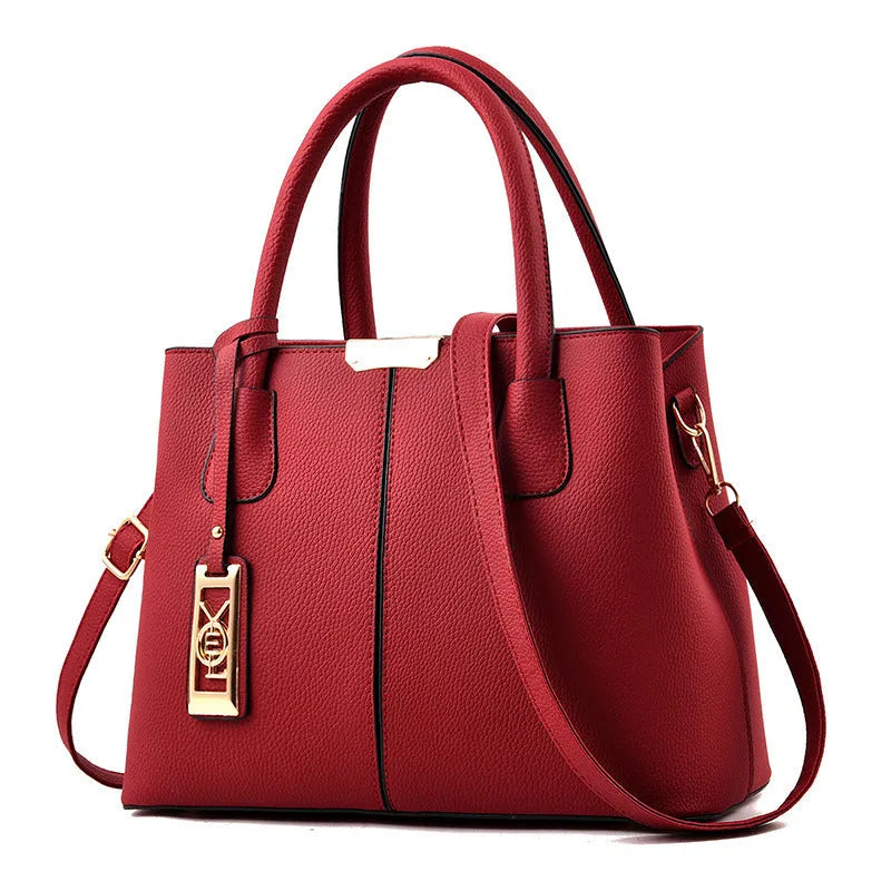 Women's square shoulder bag in soft PU leather with leather strap, shown in multiple colour options
