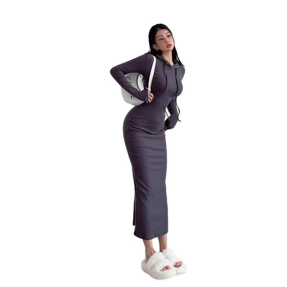 A woman's long sleeve hooded sheath dress in polyester, showing the high waist and over-the-knee length.