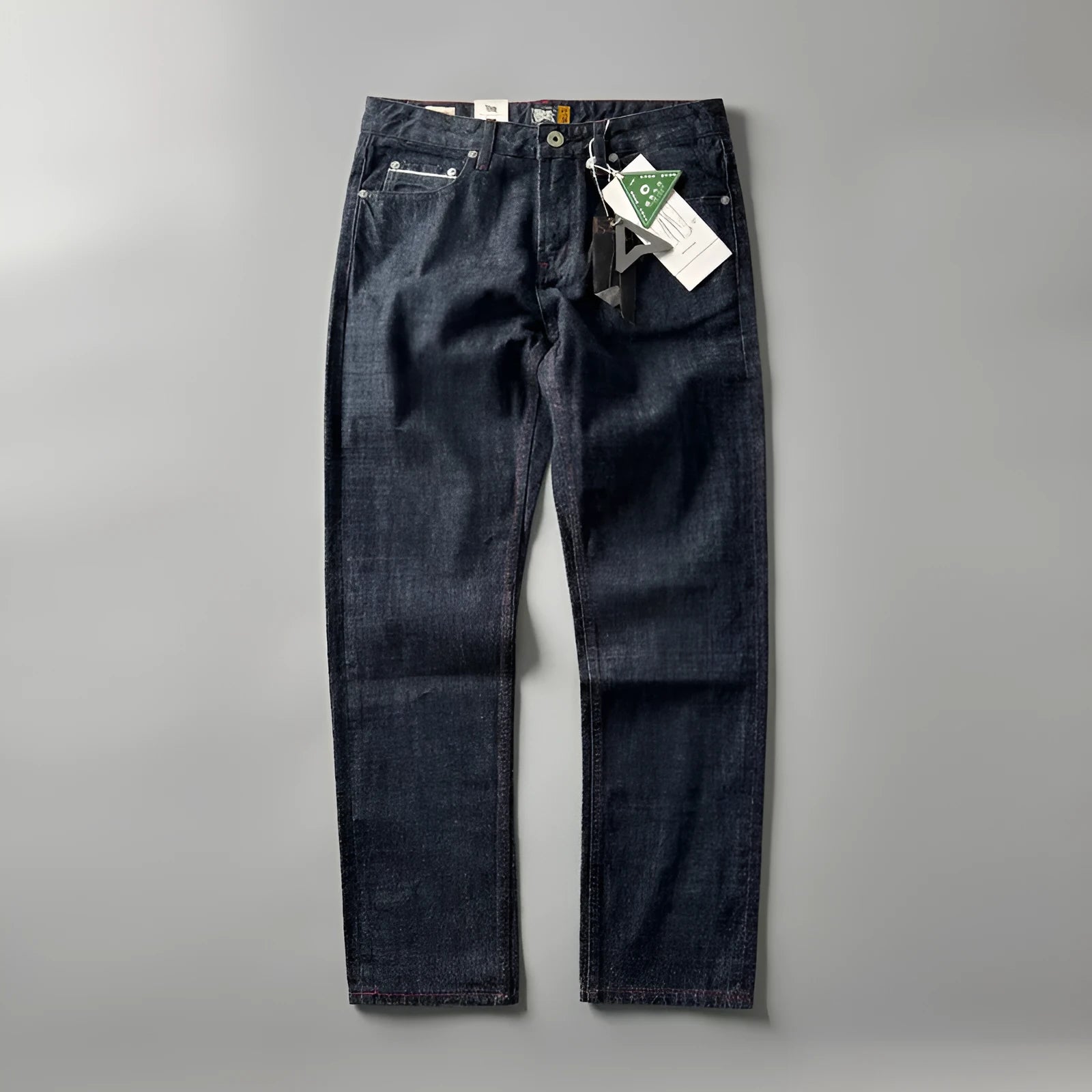 Men's straight leg cotton denim trousers in primary colour with mid-rise waist and retro American style.