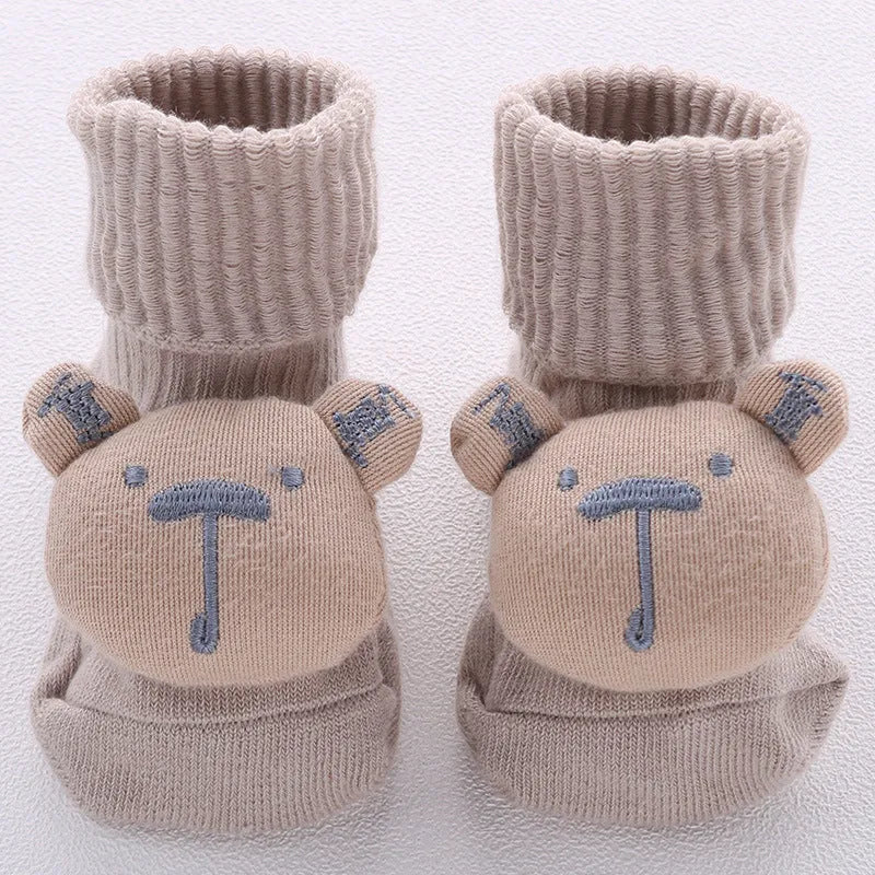 Cotton baby floor socks with anti-slip soles in animal designs for infants and toddlers