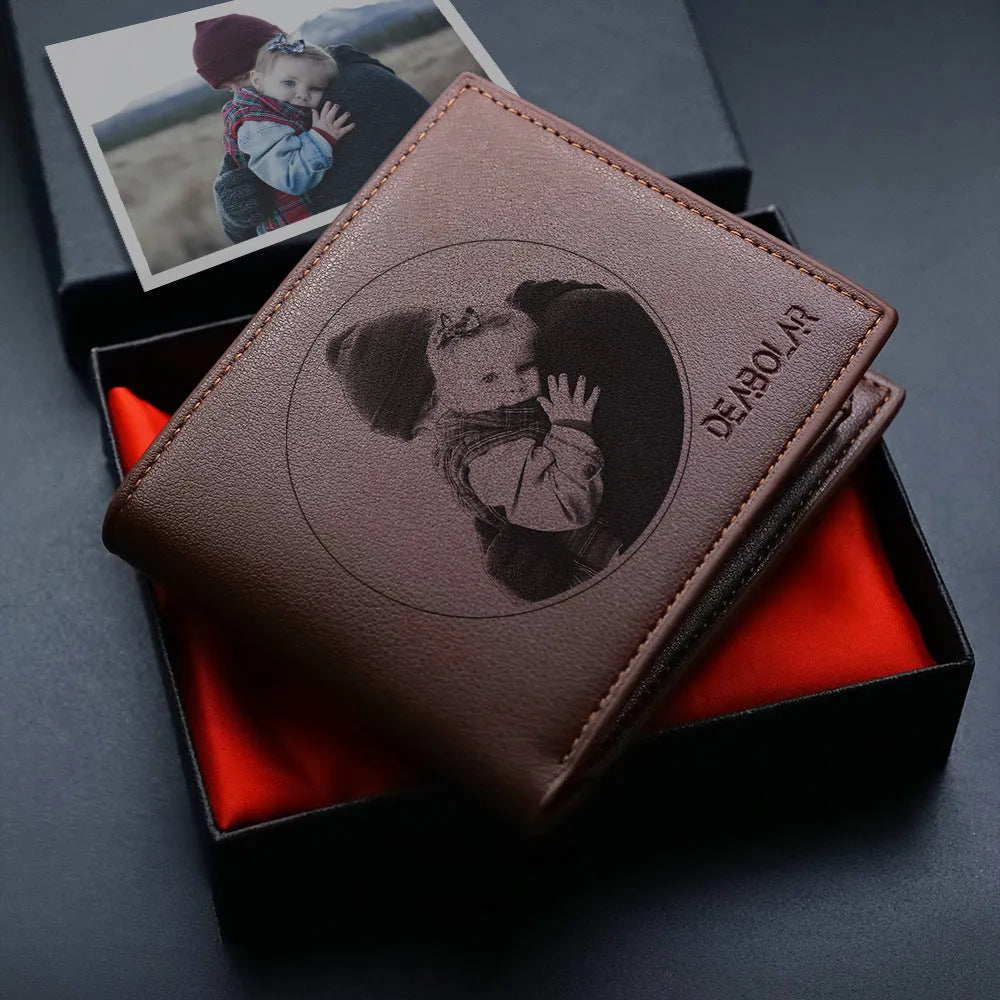 Men's brown leather wallet with a silver zipper closure, shown with individual packaging.