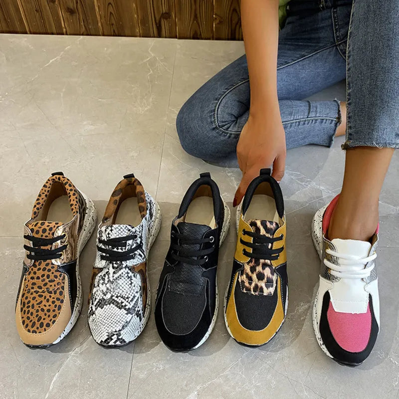 Women's suede flat sneakers with a wedge heel in black, leopard, pink, panther, and snake pattern colour options