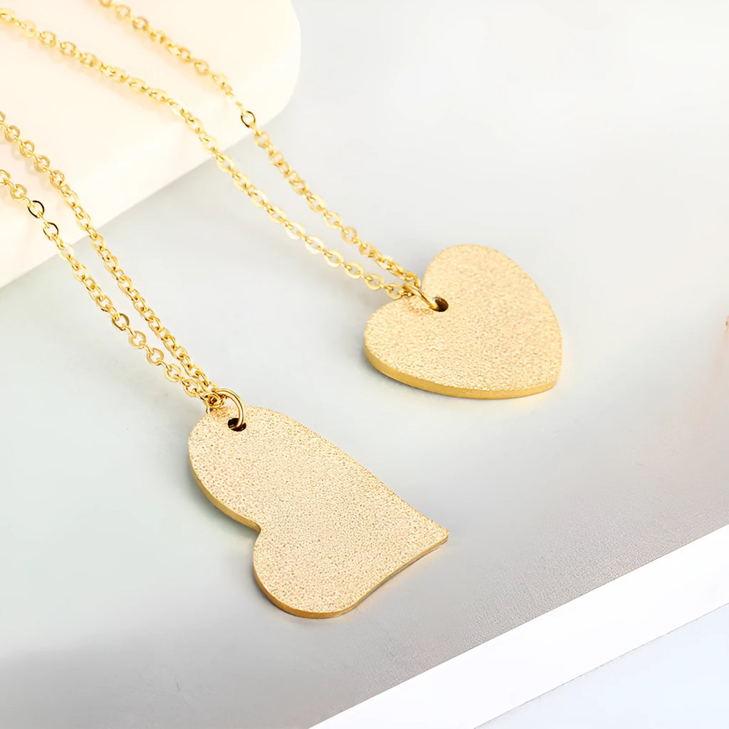 Women's titanium steel necklace with a geometric heart-shaped pendant in colour KN25736-Z