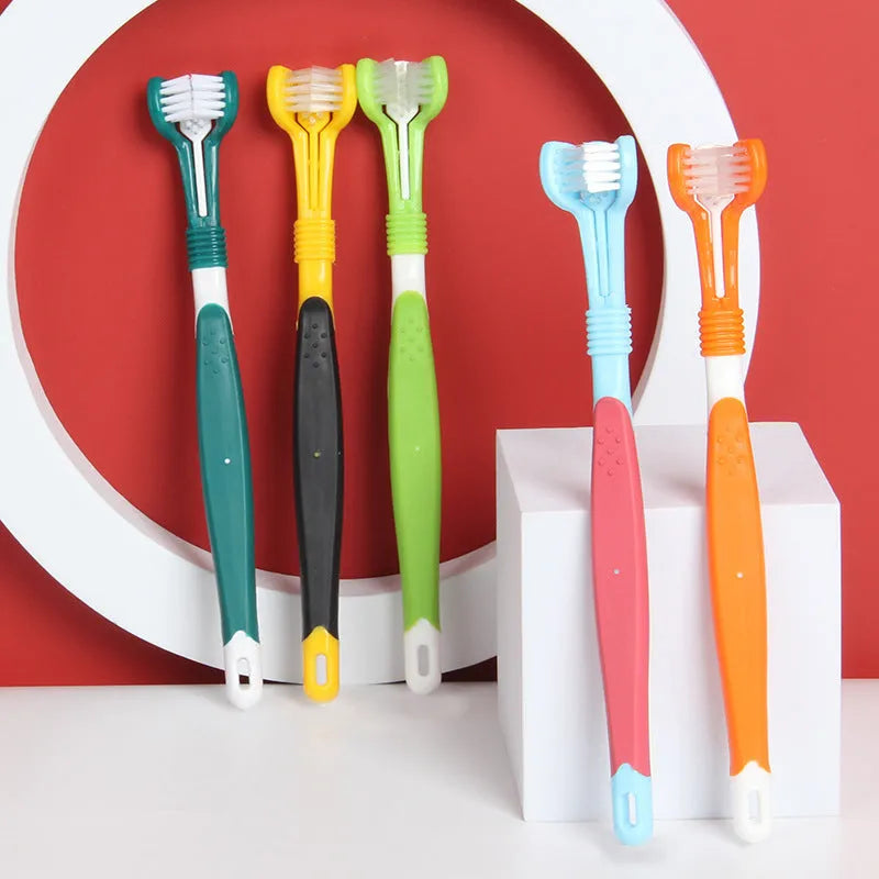 Three-head plastic pet toothbrush for dogs in grass green colour for oral cleaning