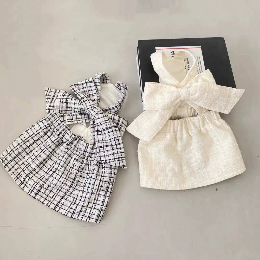 Cotton sling skirt dog clothing in black and white or white, sizes XS to XL