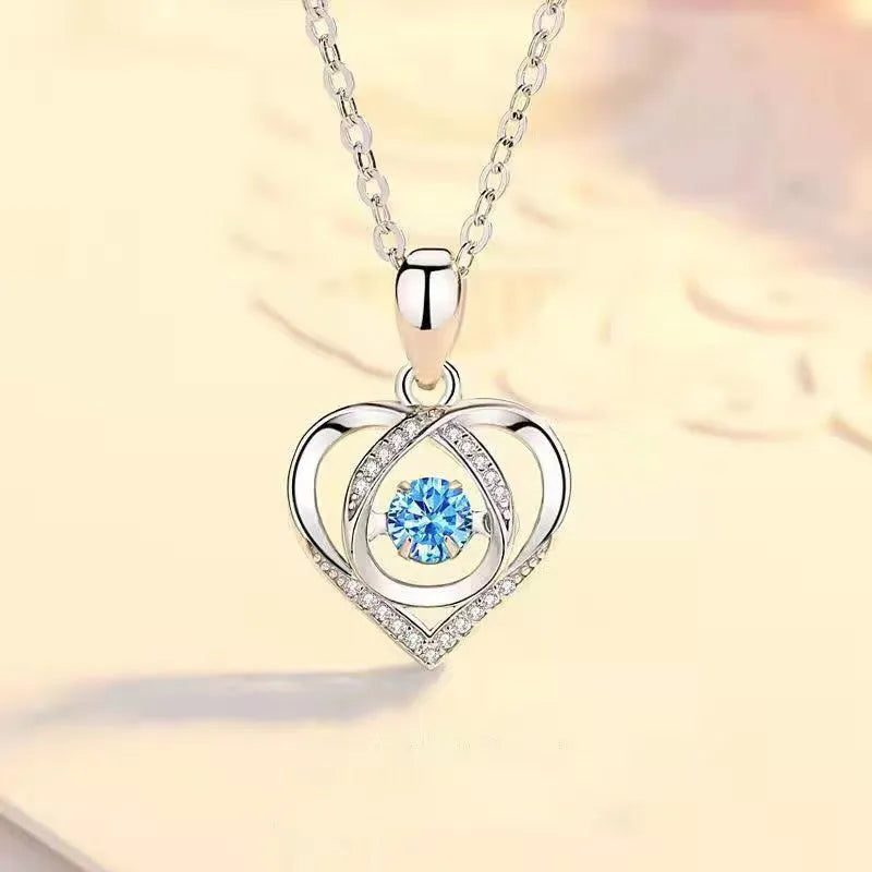 Blue diamond love heart necklace and bracelet jewellery set with mixed gem inlaid pendant