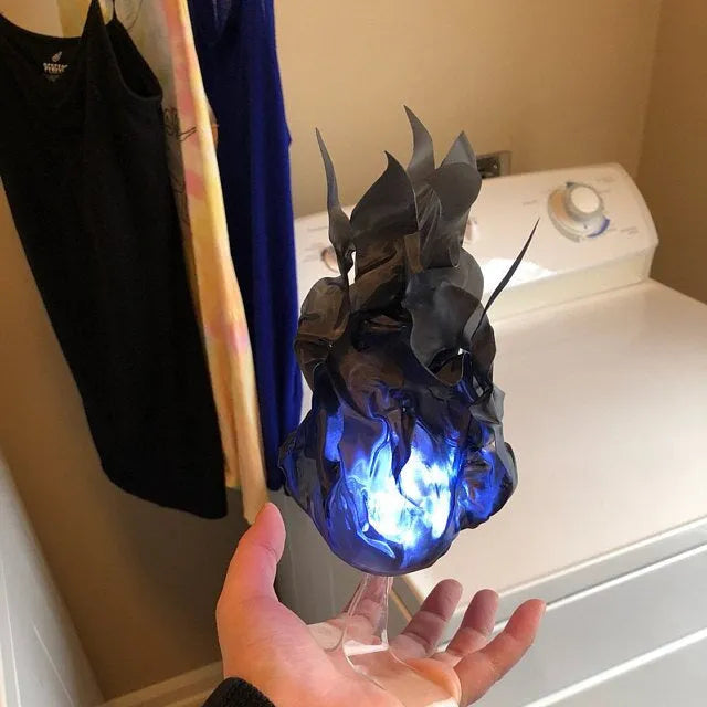 Halloween floating fireball flame prop with LED lights in grey blue green red colours on black background