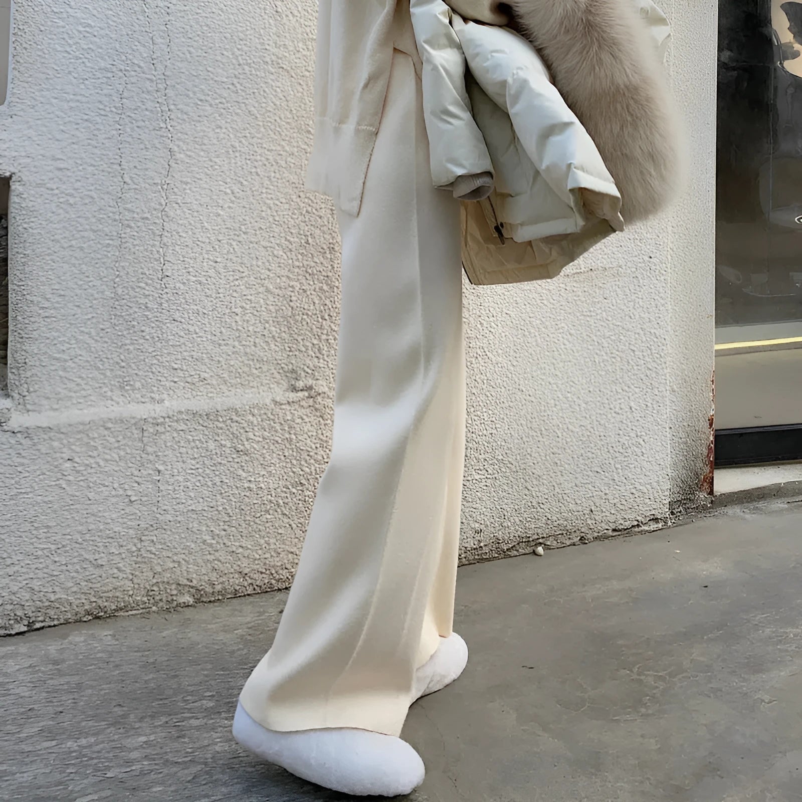 Women's high-waisted thick knitted wide-leg trousers in cream white for autumn winter wear