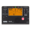 Black and silver digital metronome tuner with plastic shell and TAP TEMPO button for piano and guitar practice