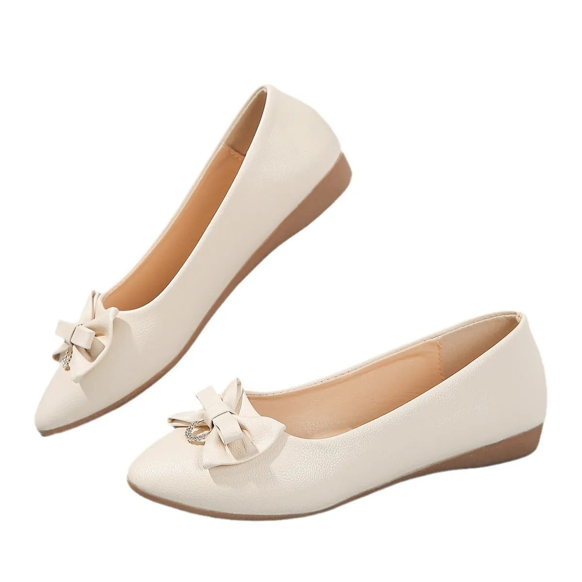 Women's beige casual flat slip-on shoe with a bowknot and round toe on a rubber sole.
