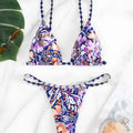 Women's floral print polyester bikini swimsuit with triangle cup top and briefs style bottoms