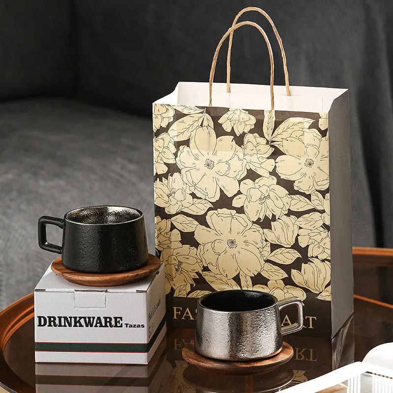 250ml solid colour tumbler cup inside a gold plated gift box with a matching gift bag.