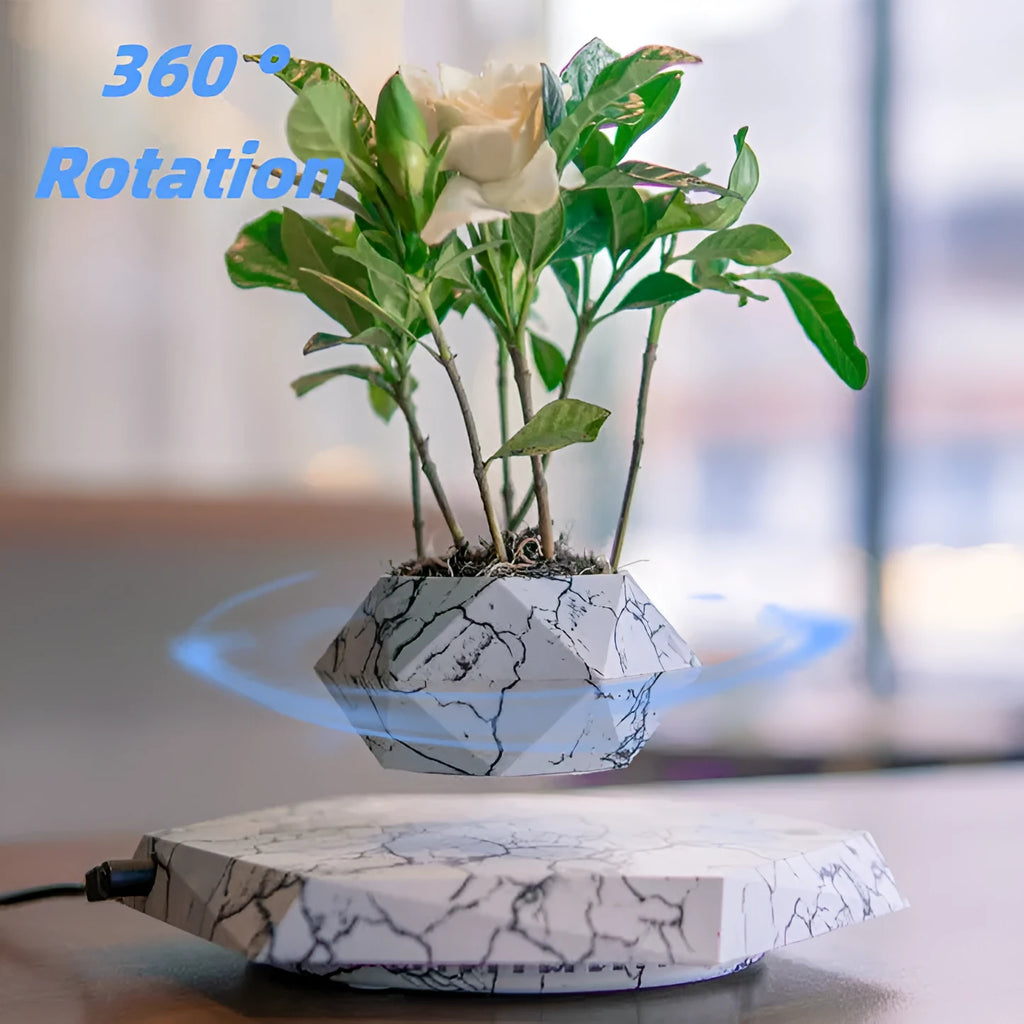 Magnetic levitating plant pot floating in mid-air with marbling colour design
