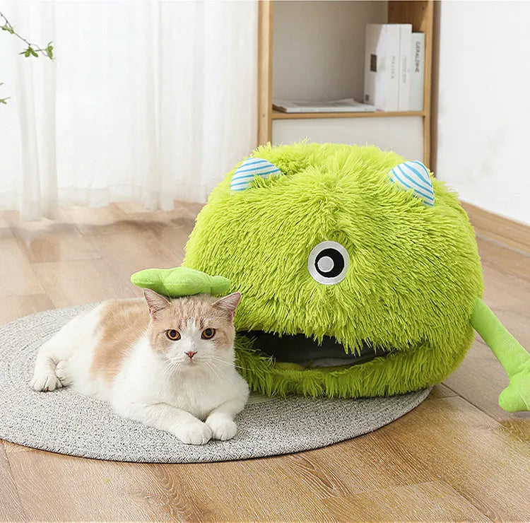 Fluffy round plush cat bed with a non-slip bottom, shown in grey.