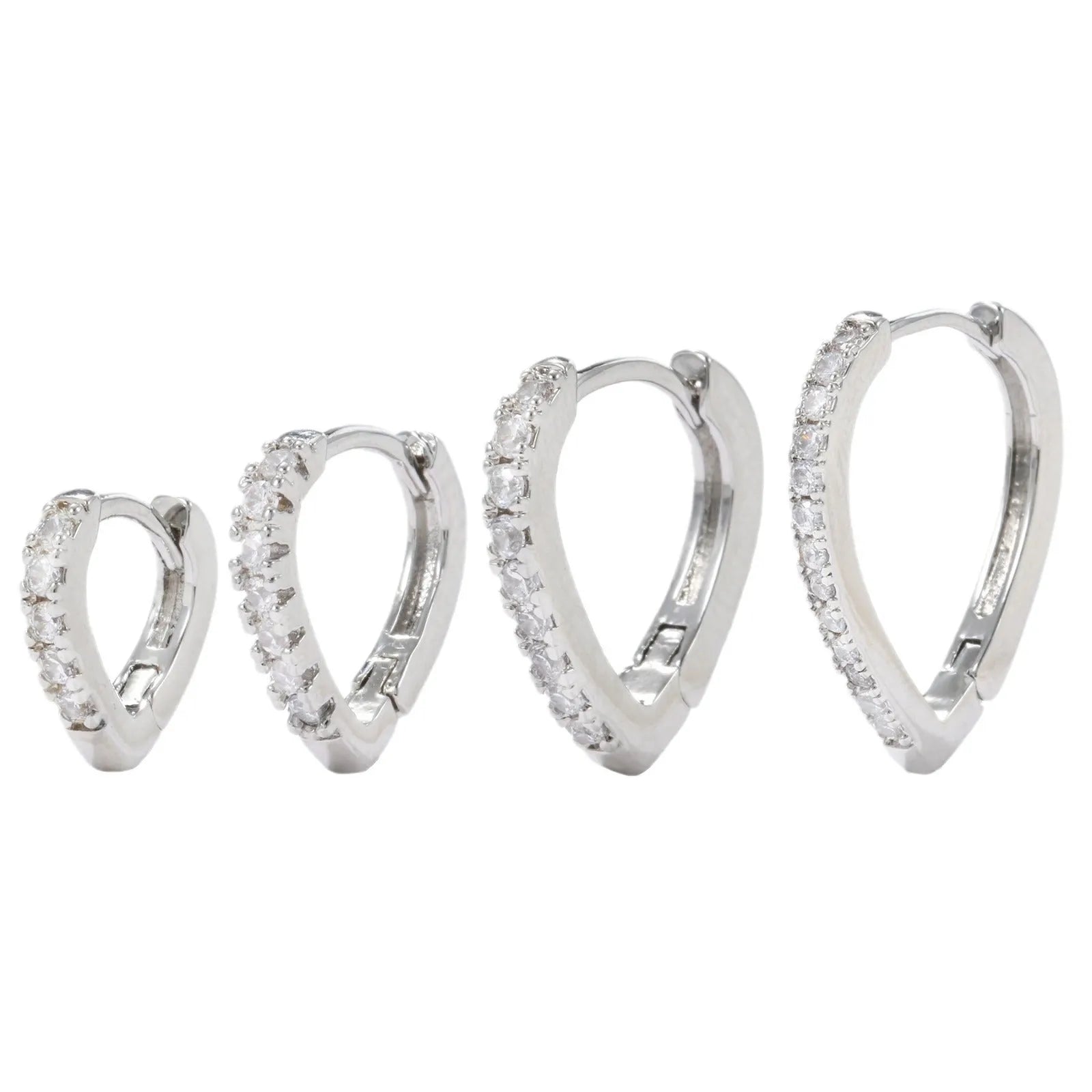 Geometric heart-shaped ear clips in gold and white colours on copper with clip back
