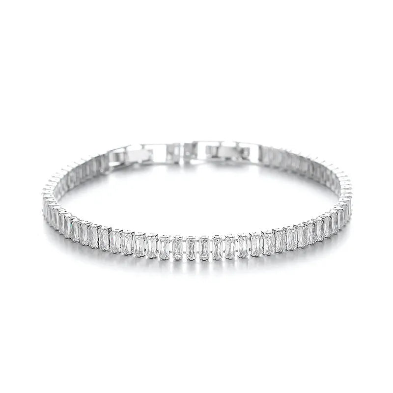 Rectangular brass bracelet with quadrilateral diamond pattern in gold or silver colour