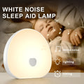 White rechargeable baby night feeding comforter with music function on nursery table