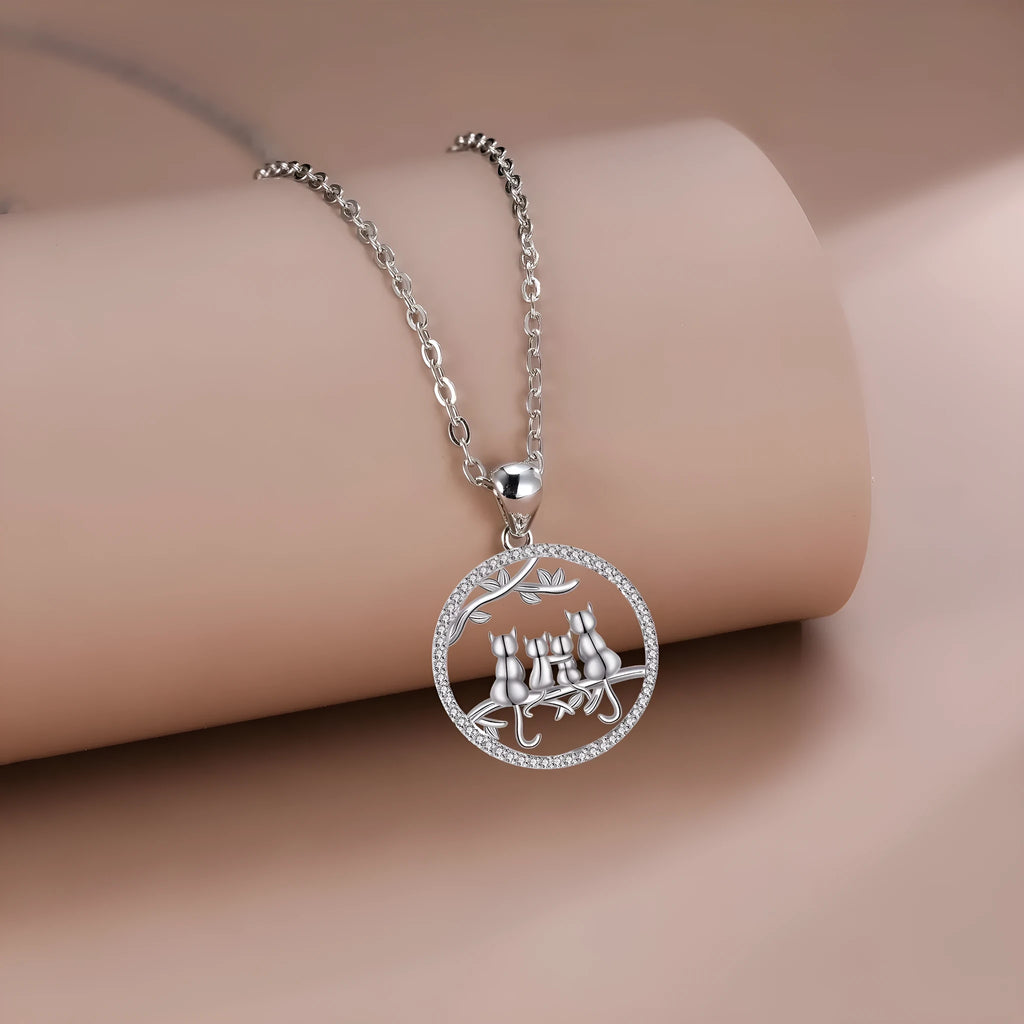 Copper necklace with four kitten pendant design and cross chain style