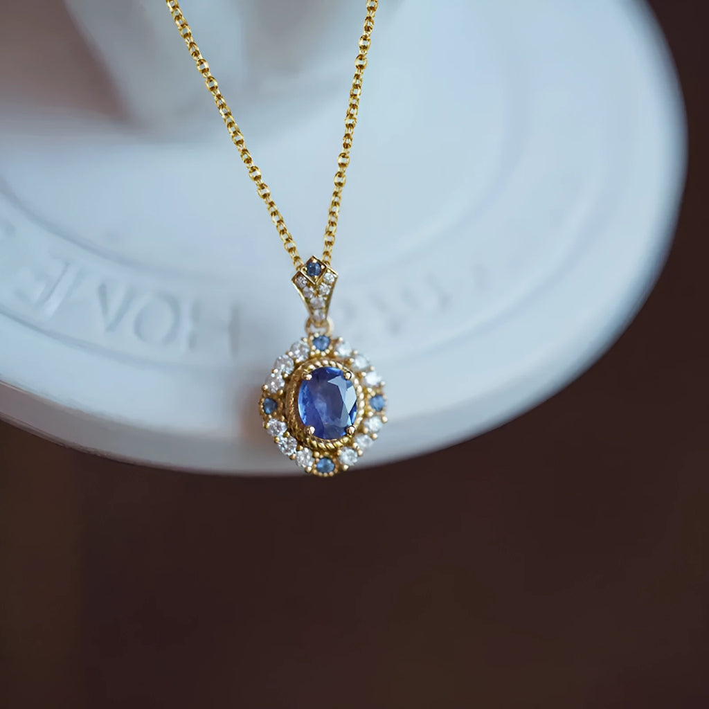 Royal style gold necklace with mixed gemstone pendant on adjustable copper box chain