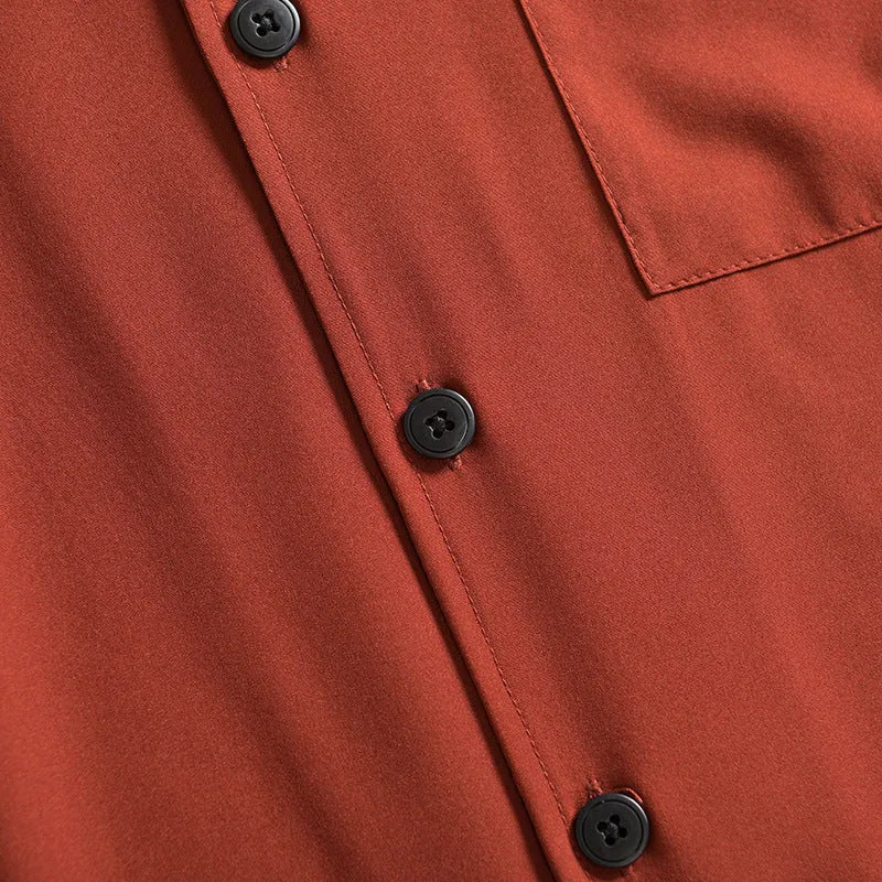 Men's loose fit lightweight short sleeve shirt in a solid colour, showing front design.