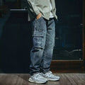 Blue men's loose fit straight leg stretch denim jeans with a zip fly closure.