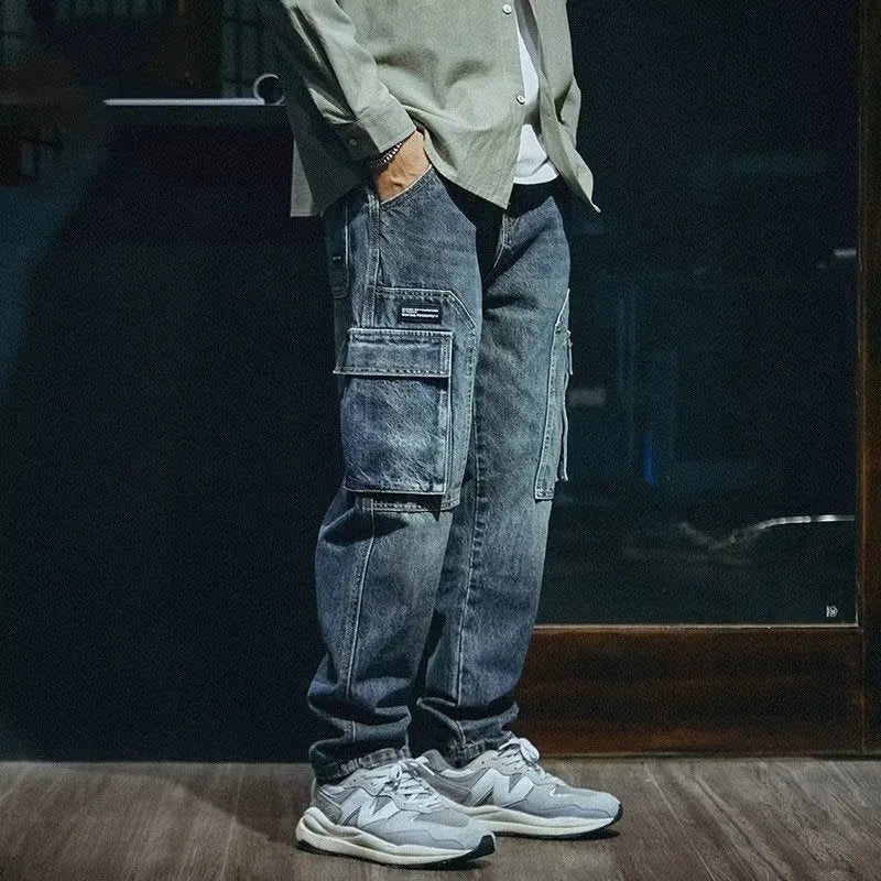 Blue men's loose fit straight leg stretch denim jeans with a zip fly closure.