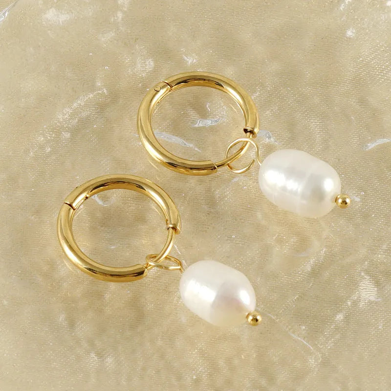 Gold geometric pearl earrings in stainless steel with titanium steel components