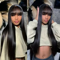 A woman wearing a long, natural-coloured human hair wig with a full-mechanism headgear base.