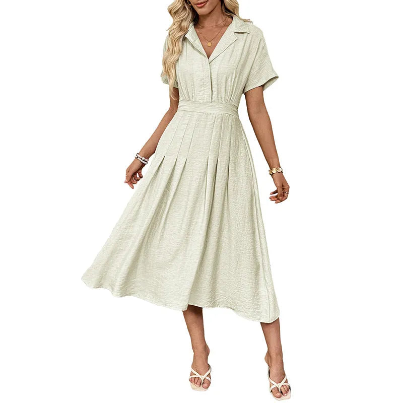 Light green women's shirt dress with lapel collar, waist tie, and side pockets.