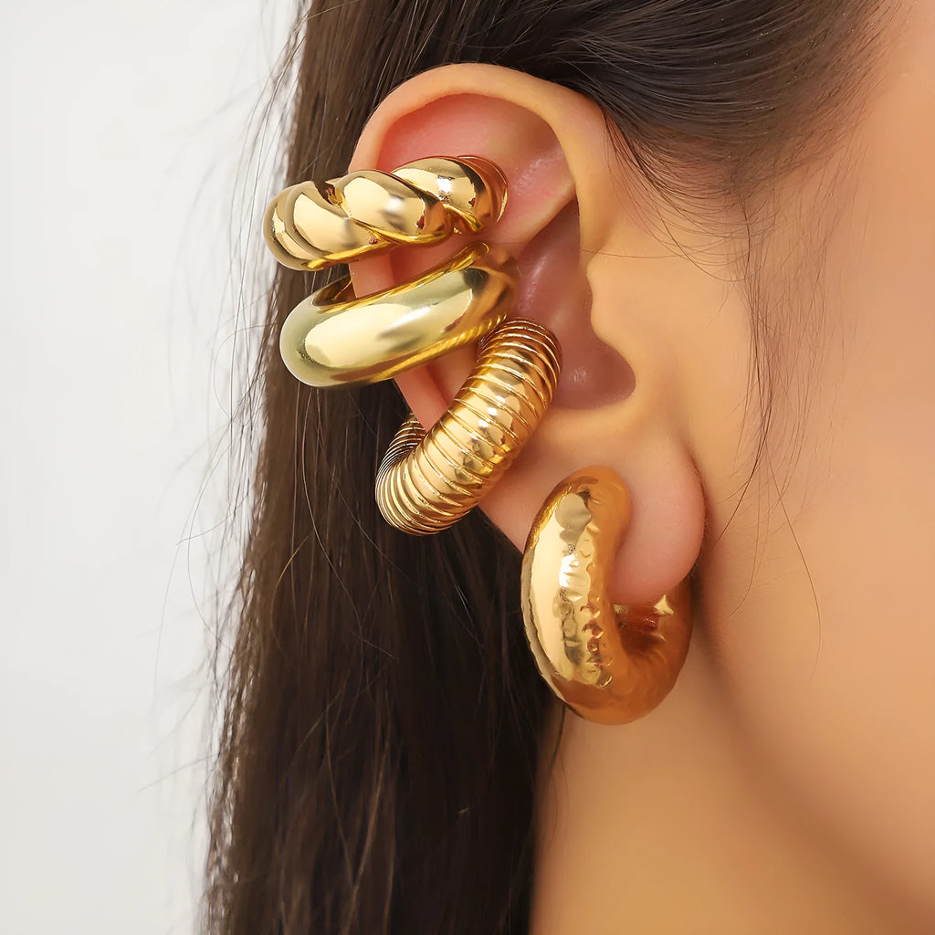 Set of four geometric gold and silver ear clips for non-pierced ears, ins style.