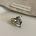 Gold plated wide open ring with retro distressed bow front and geometric metal shape for women